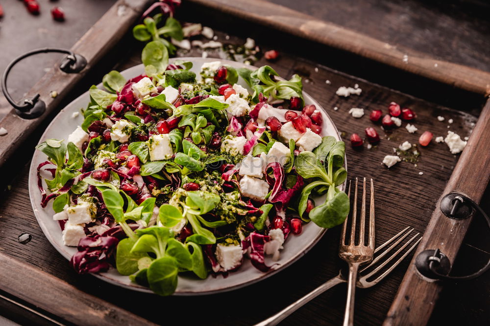 Similar – Green salad with pomegranate, manna croup, onion