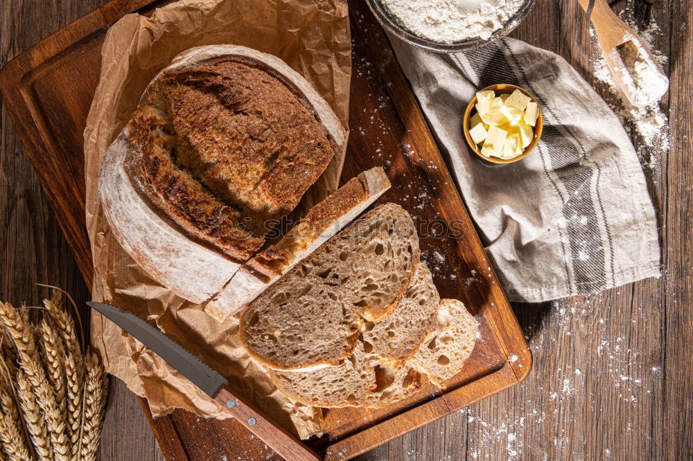 Similar – fresh bread and baked goods on wooden