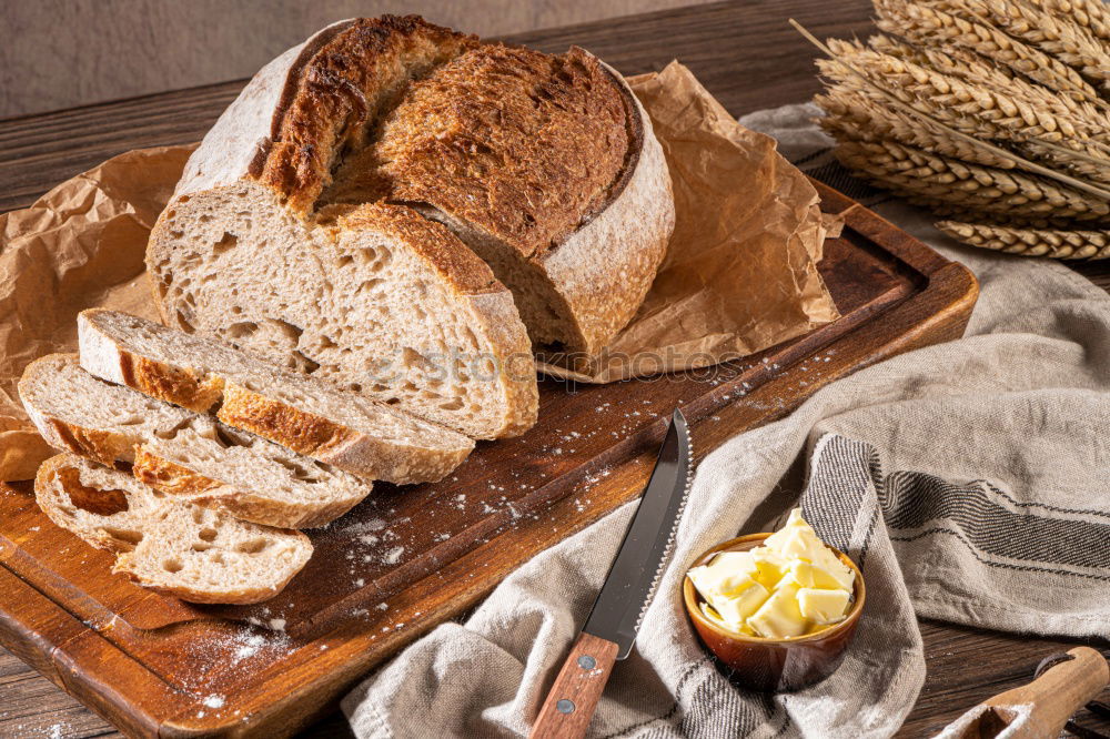 Similar – fresh bread and baked goods on wooden