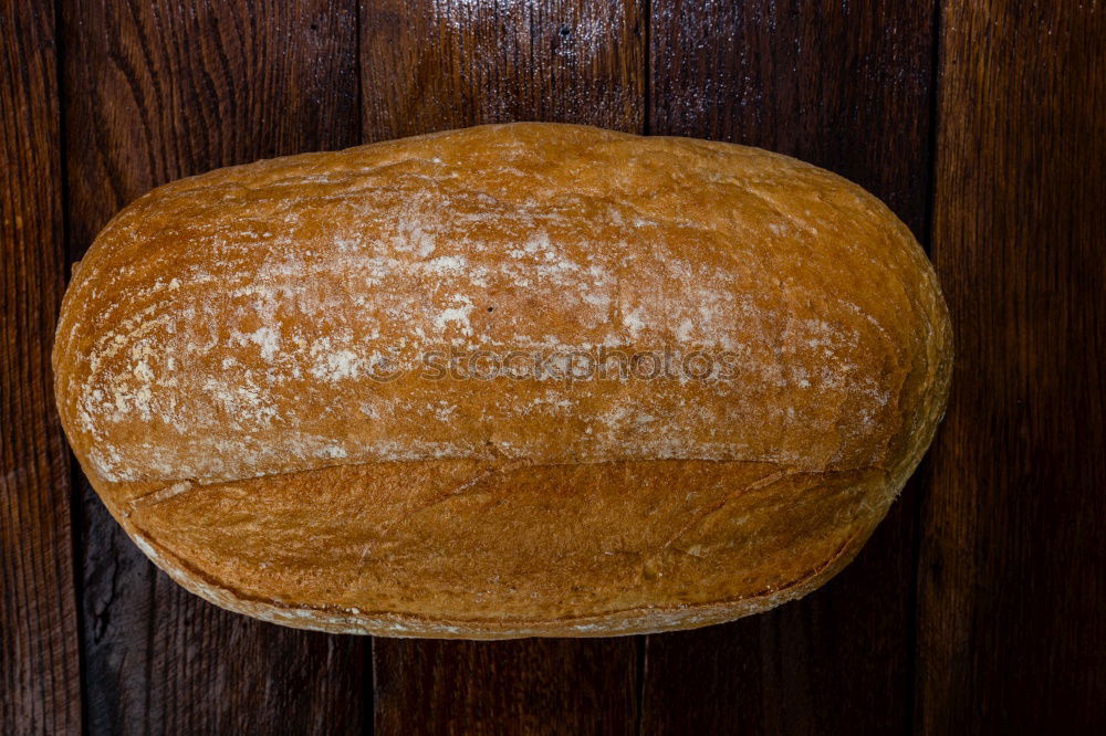 Similar – whole baked round bread