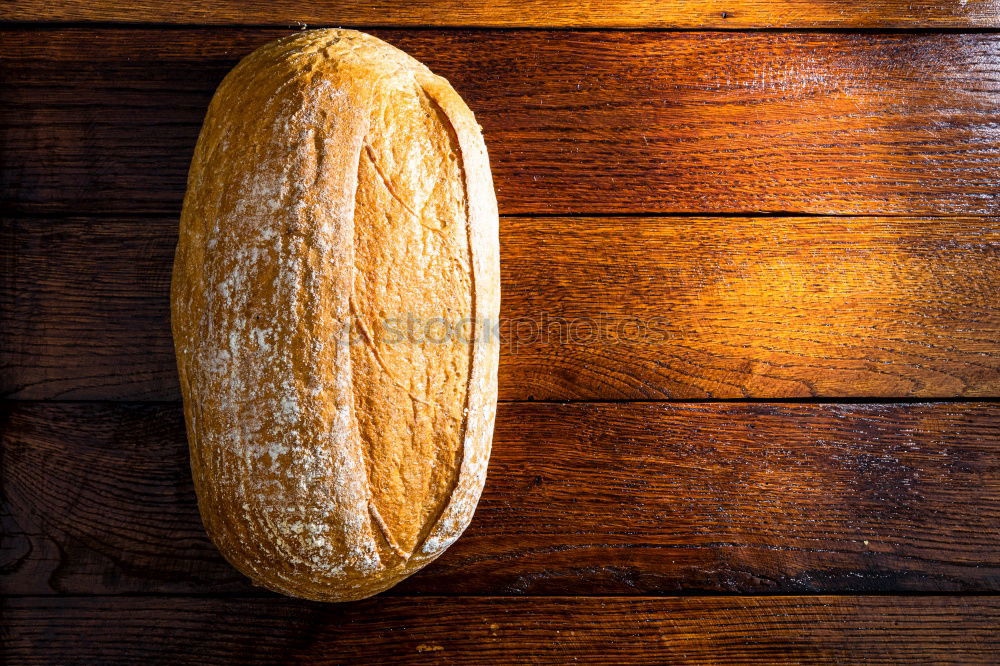 Similar – Image, Stock Photo rye-bread bread with sunflower seeds