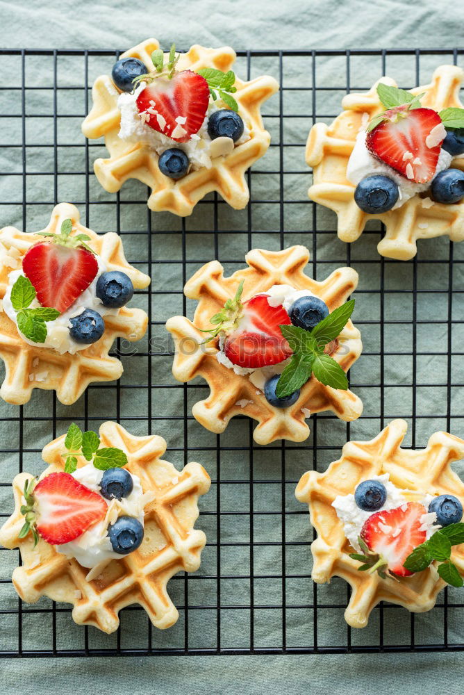 Similar – Image, Stock Photo Delicious tartlets with raspberries and blueberries