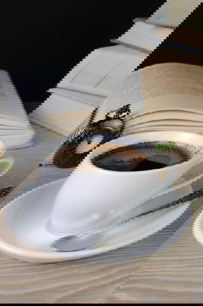 Similar – Image, Stock Photo A cup of coffee on a leather couch