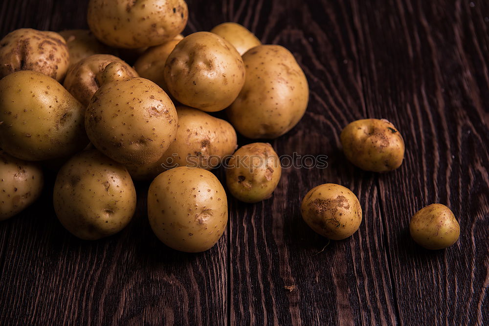Similar – Image, Stock Photo fresh ripe yellow pears on a brown wooden table