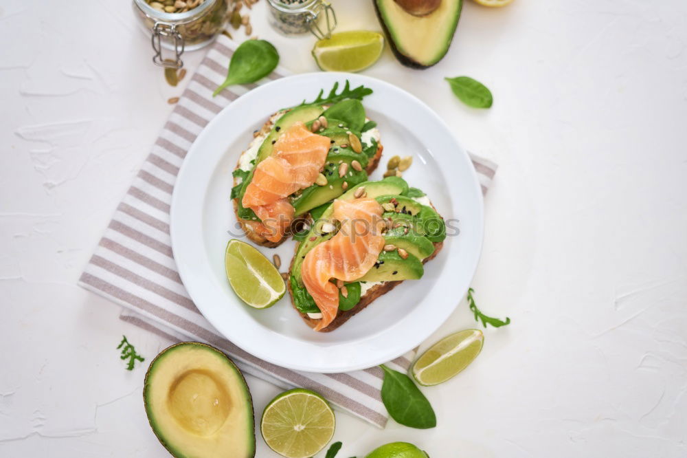 Fry salmon fillet with dill, lemon, oil and tomatoes