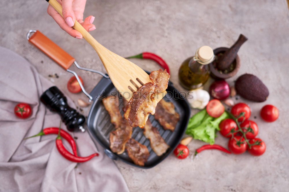 Similar – Image, Stock Photo Sliced grill steak on cutting board with wine and spices