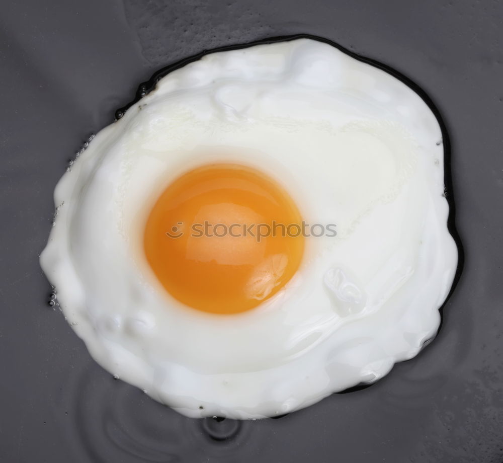 Image, Stock Photo Fried egg for breakfast