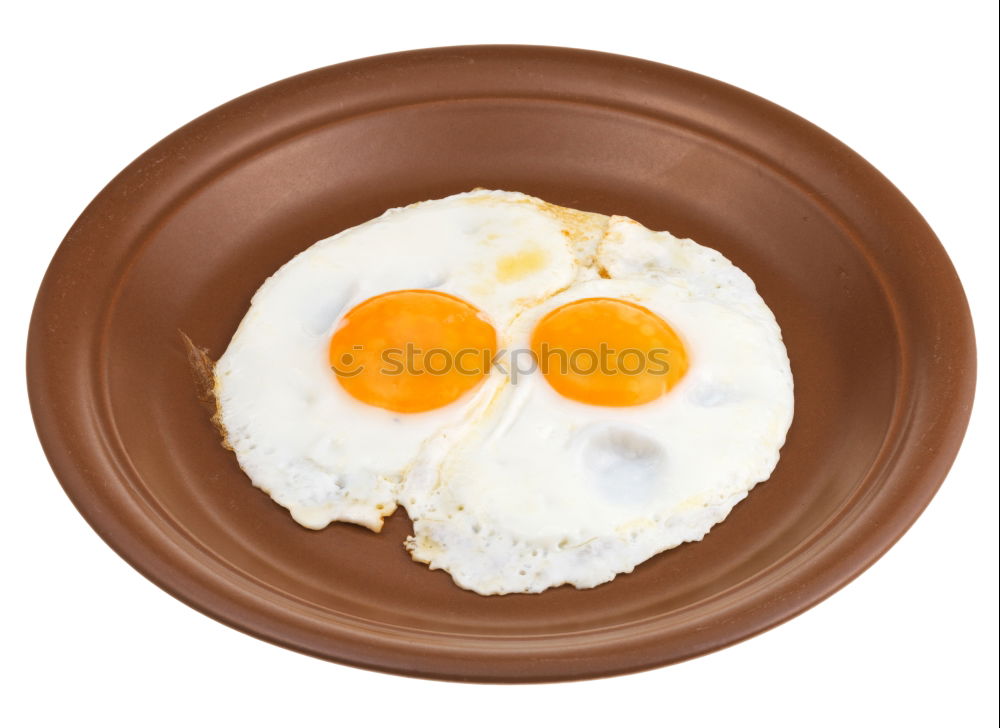 Similar – Fried egg face on wood