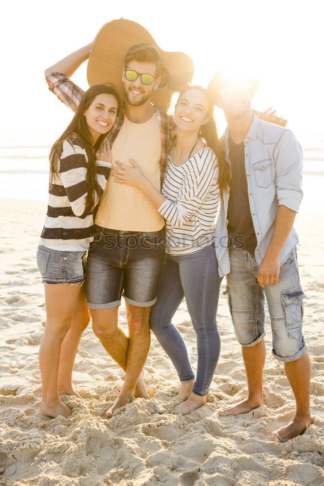 Similar – Happy best friends having good time on the beach together