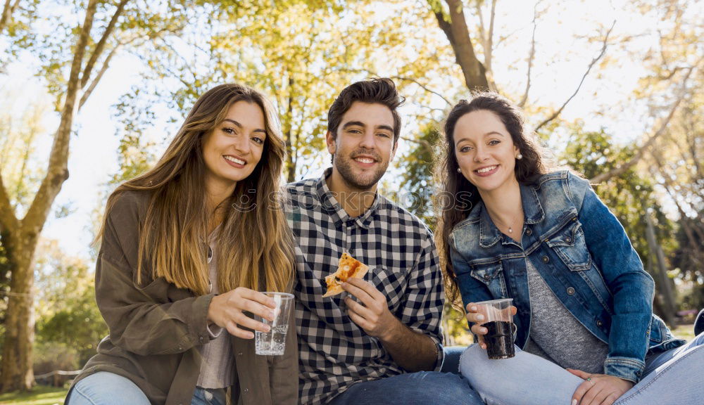 Similar – Image, Stock Photo Group of friends taking selfie in urban background.