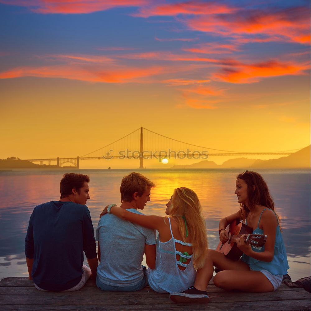 Similar – Image, Stock Photo Group of young adult friends having picninc together