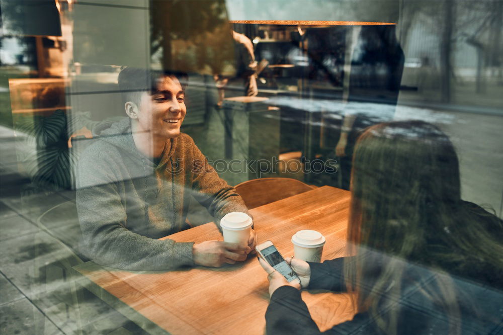 Similar – Young man receiving coffee at café