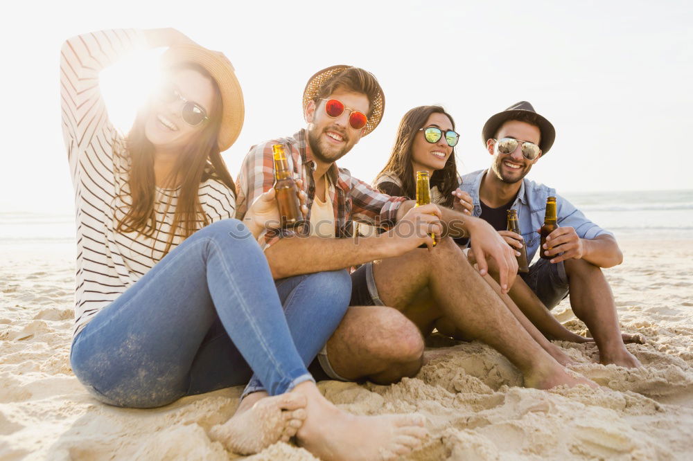 Similar – Image, Stock Photo Group of young adult friends drinking beer at the beach party