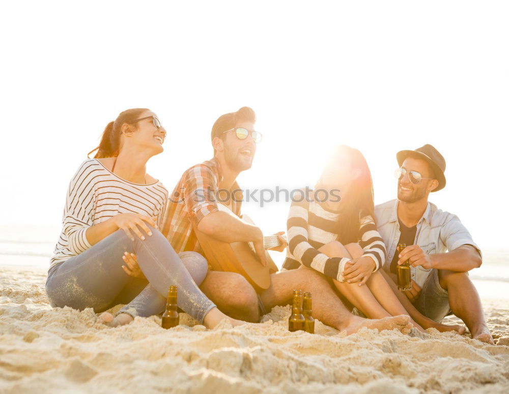 Similar – Happy family standing on the beach at the day time. People having fun outdoors. Concept of summer vacation and friendly family.