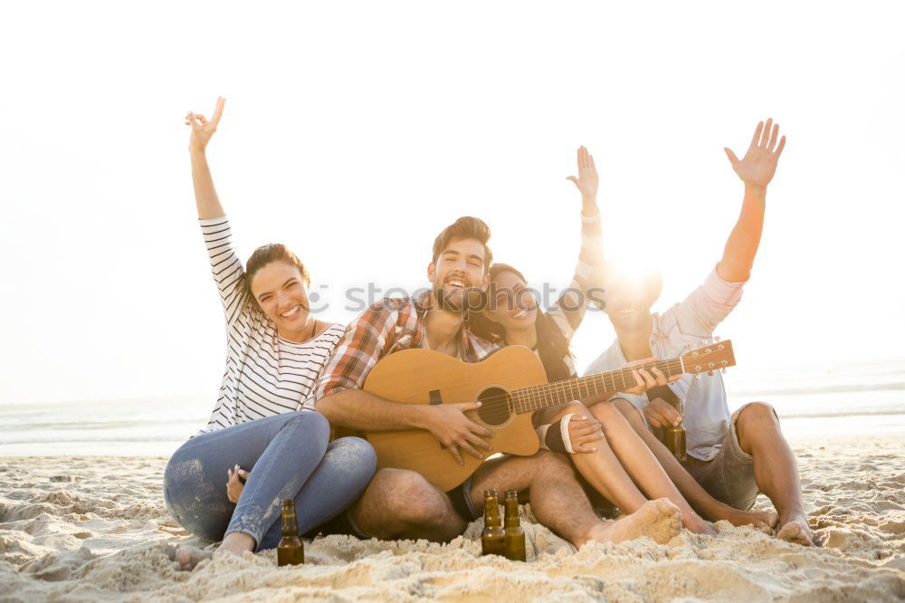 Similar – Image, Stock Photo Group of hipster friends cheering with confetti in sunset