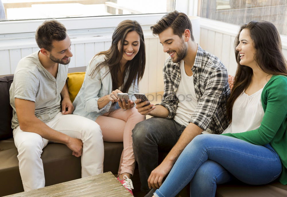 Similar – Multi-ethnic group of people looking at a tablet computer