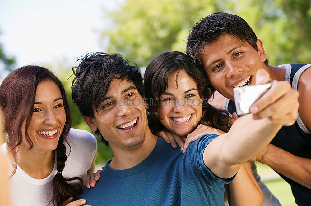 Similar – Image, Stock Photo Group of friends taking selfie in urban background.