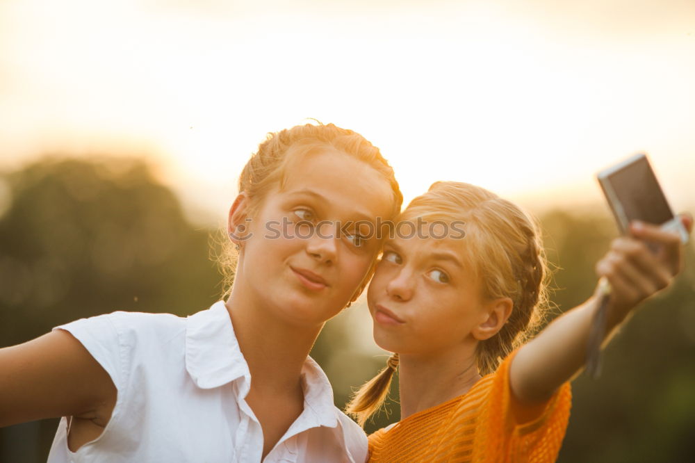 Similar – happy mother and daughter making selfie outdoor