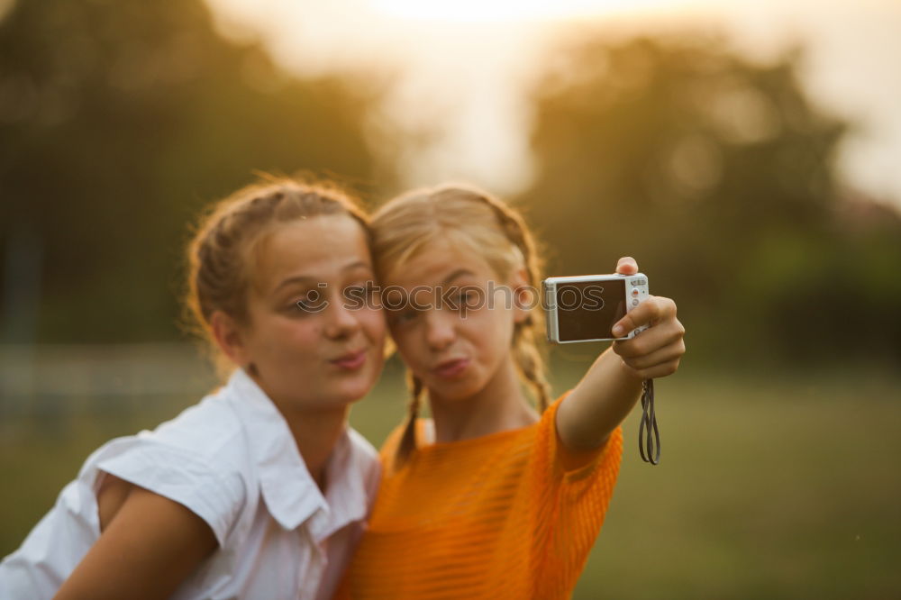 Similar – happy mother and daughter making selfie outdoor