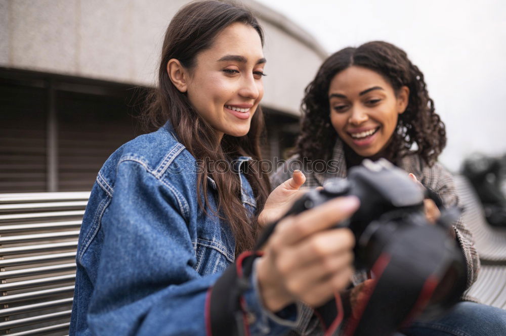 Similar – Image, Stock Photo Girl taking photo of her friend with smartphone