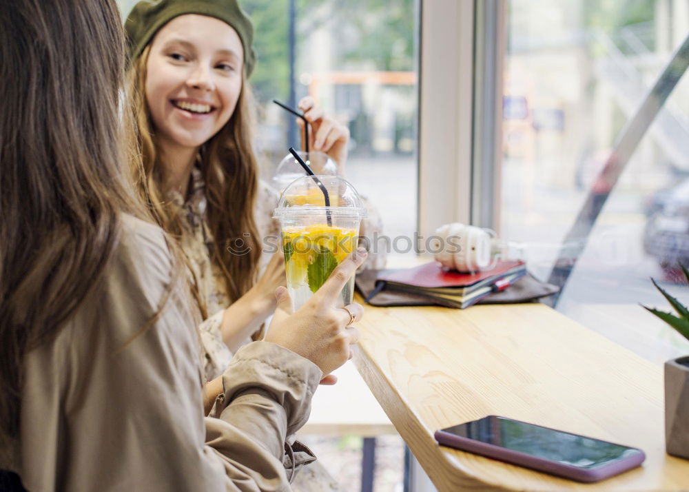 Attractive young woman paying in a shop