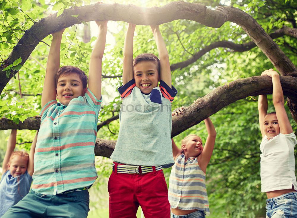 Similar – Image, Stock Photo Three kids playing with a tree painted on a wall