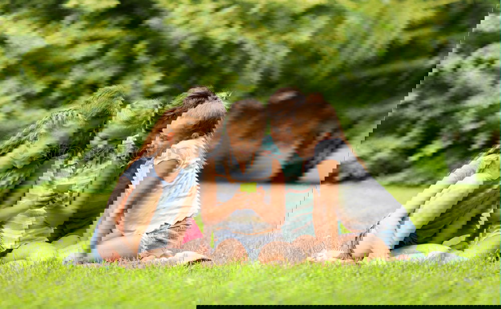 Image, Stock Photo Three happy children playing in the park at the day time.
