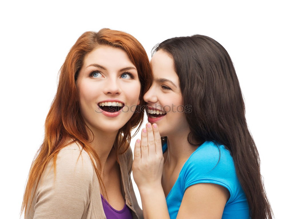 Similar – Two happy young women friends hugging in the street.