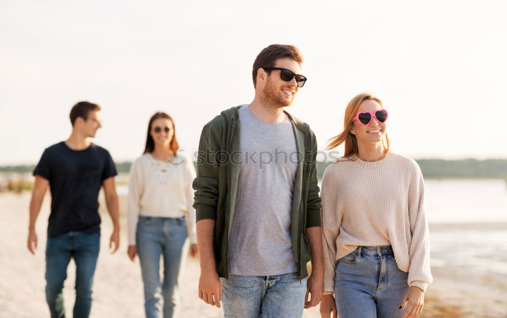 Similar – Family spending vacation time together having a snack sitting on jetty over the lake on sunny day in the summertime