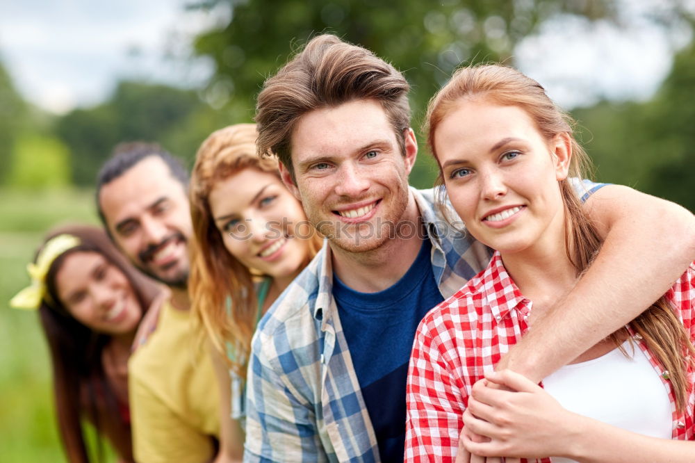 Similar – Group of friends taking selfie in urban background.