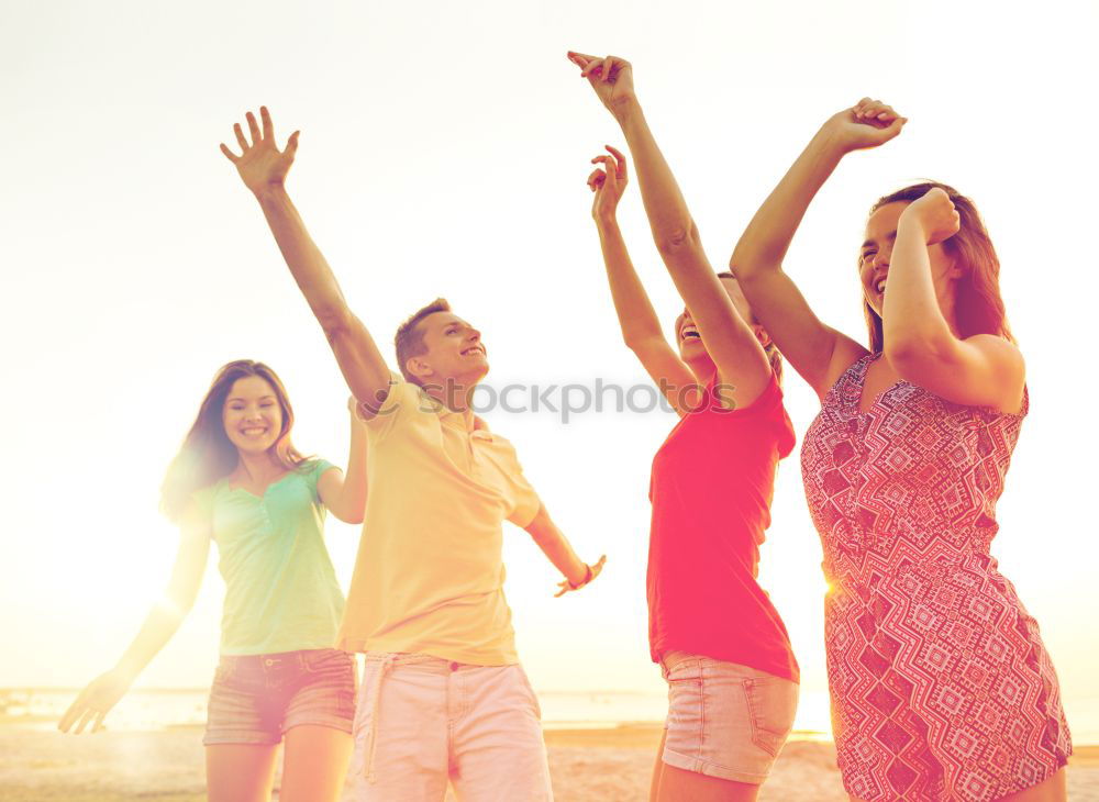 Similar – Image, Stock Photo Group of happy friends celebrating with drinks in sunset