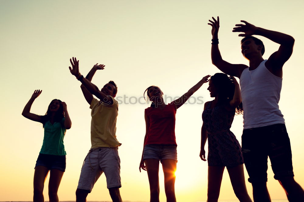 Similar – Multi ethnic group of friends dancing on music festival