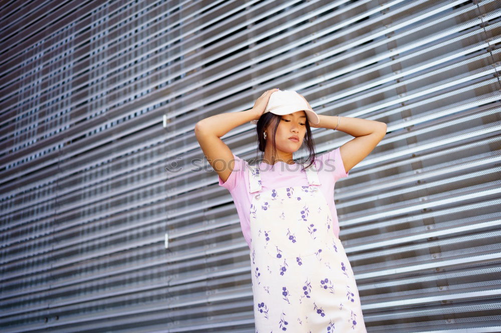 Similar – Happy young black woman surrounded by flowers