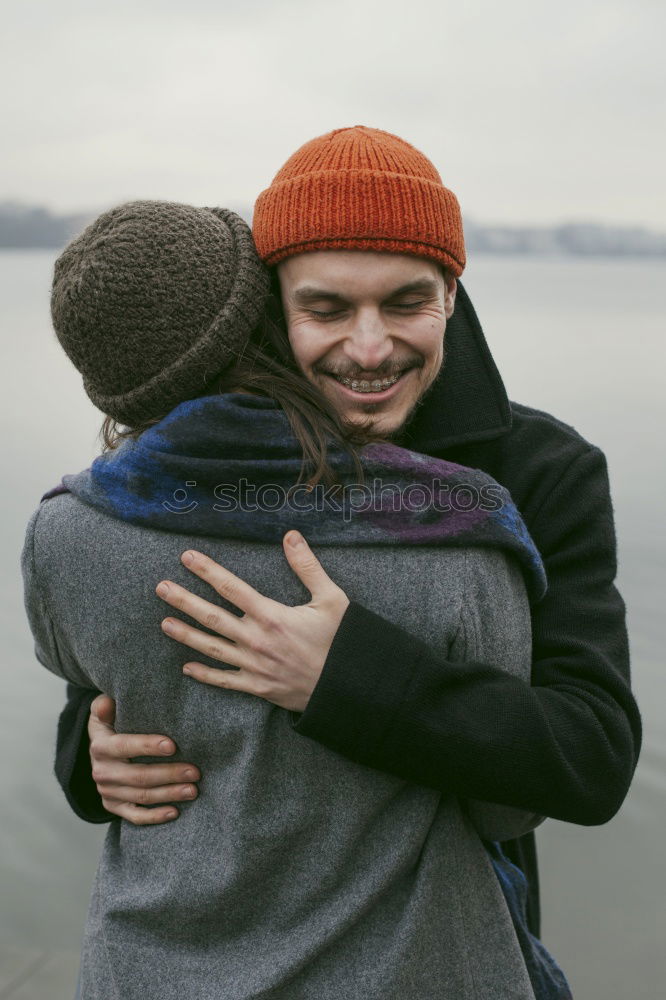 Similar – Image, Stock Photo Happy couple hugging and kissing near tree in park