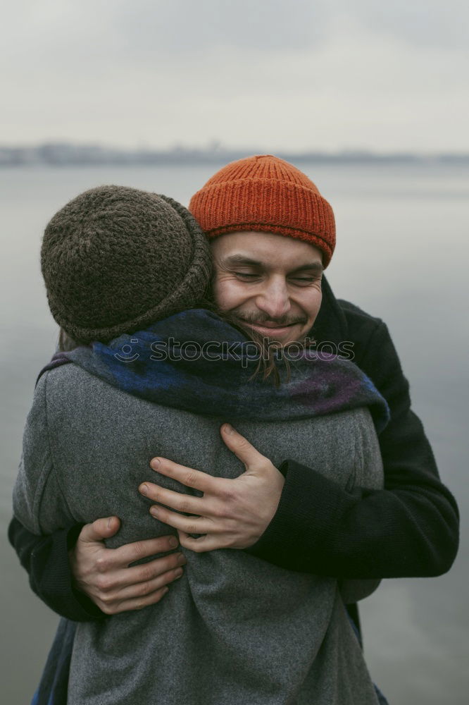 Similar – Image, Stock Photo Happy couple hugging and kissing near tree in park