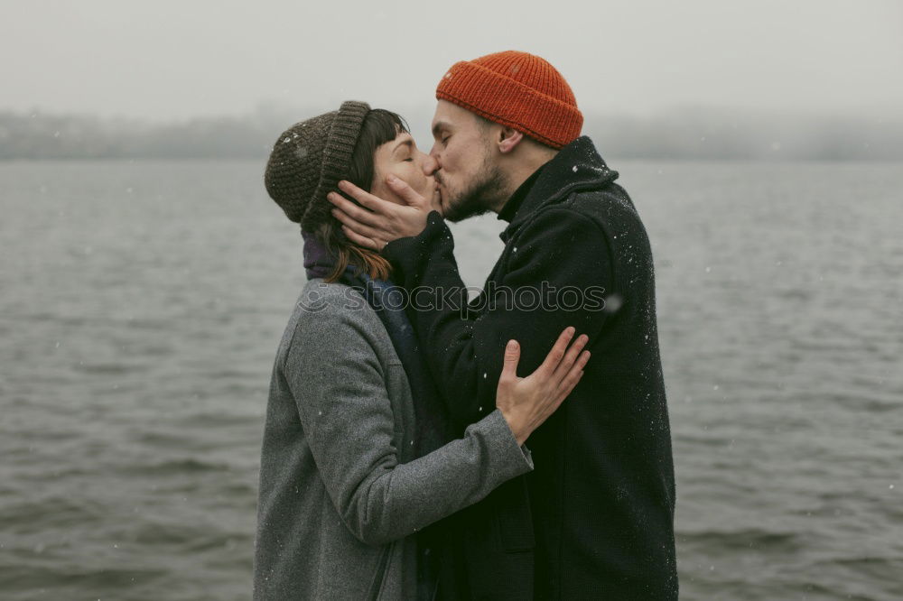 happy couple kissing outdoor