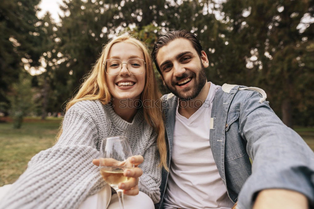 Similar – Smiling bearded man giving a piggy back to his girlfriend.