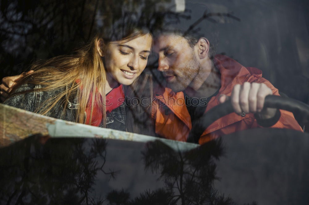 Similar – Portrait of beautiful couple in casual wear hugging in the street