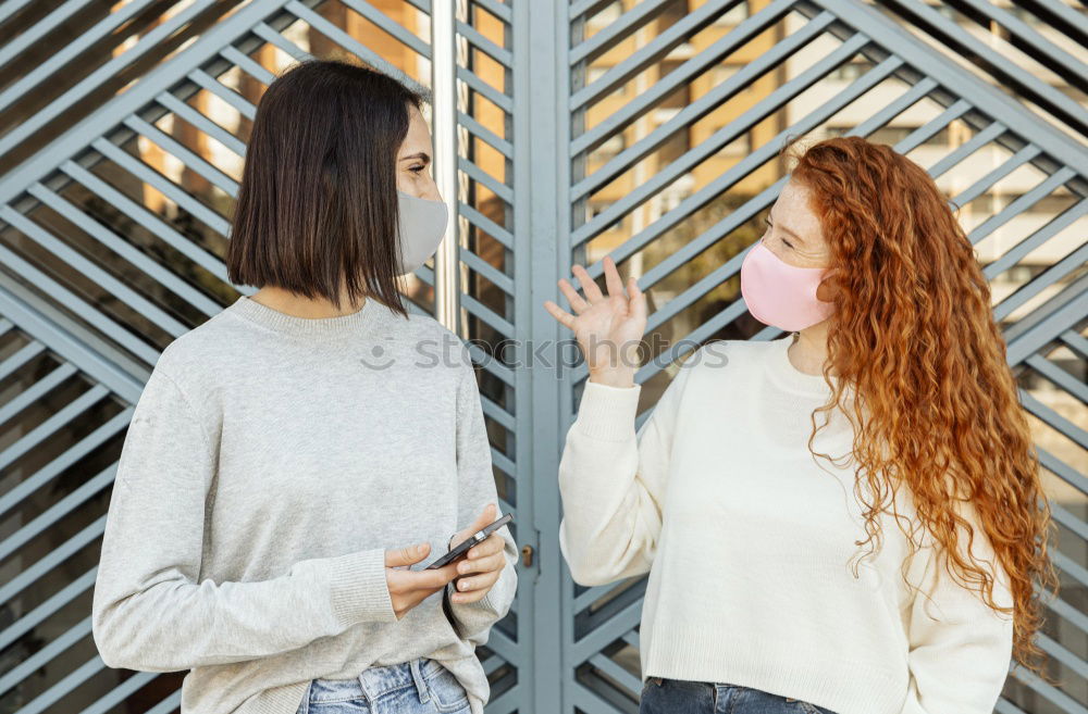 Similar – Female couple standing together