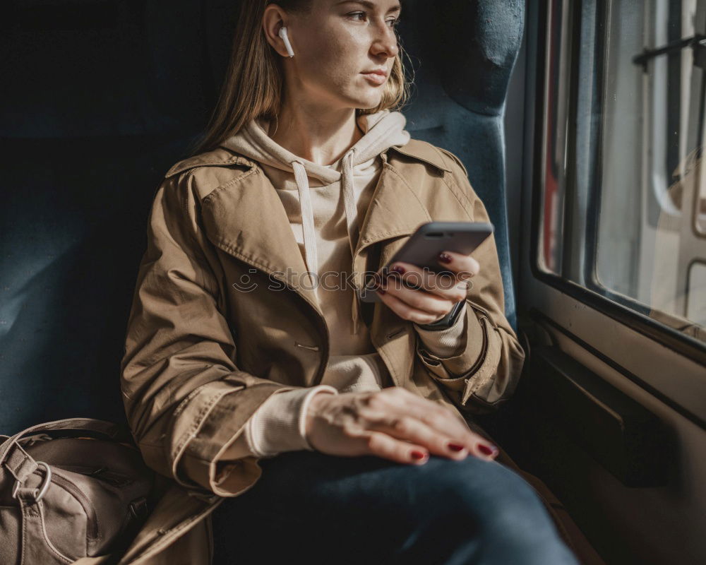 Similar – Attractive teenager sitting on steps in town