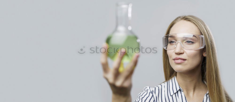 Similar – Image, Stock Photo woman holding mason jar with sassy lemon and mint water