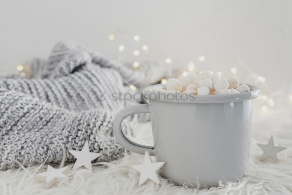 Similar – Christmas candy in the cup with snowflakes