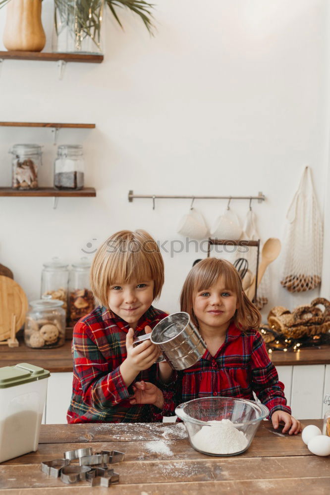 Similar – Boy in cook hat in kitchen