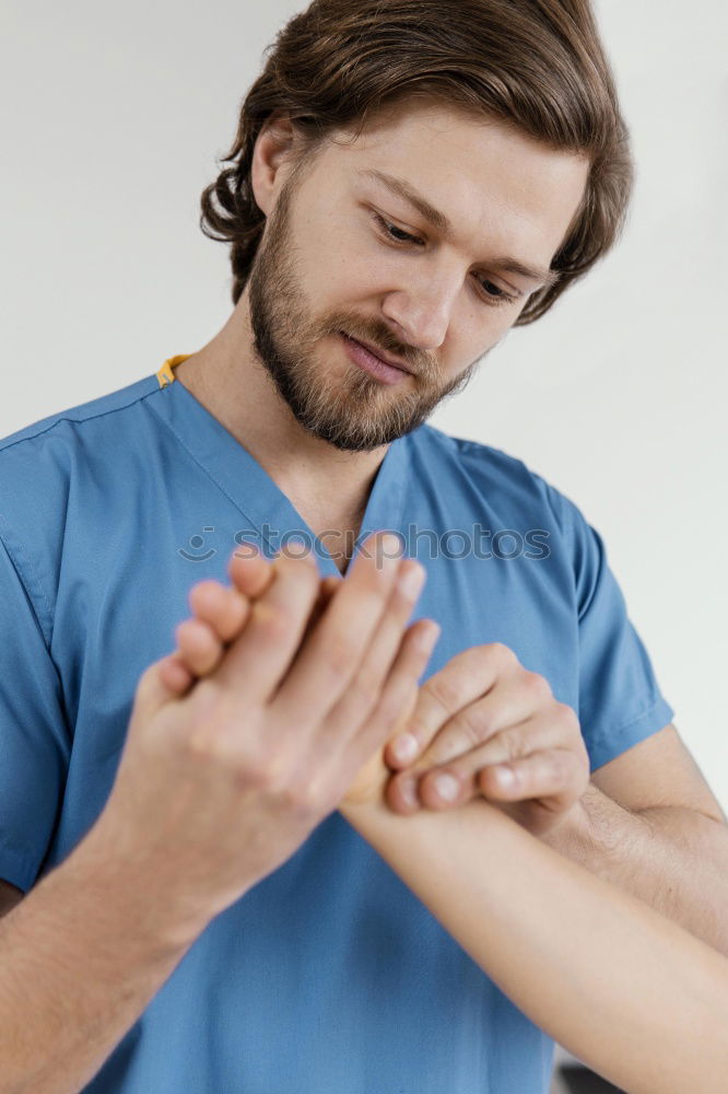 Similar – Image, Stock Photo young man at the physio therapy with pain