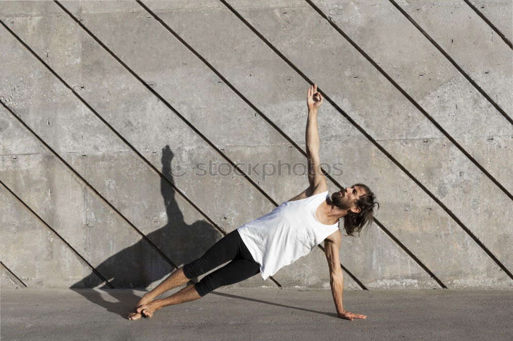 Similar – blumentopf Handstand