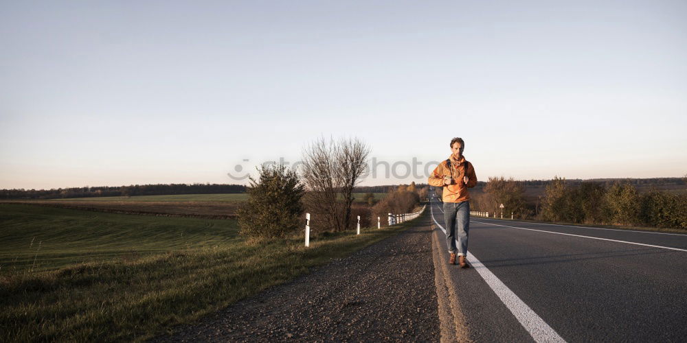 Similar – Image, Stock Photo Woman strolling on empty winter road