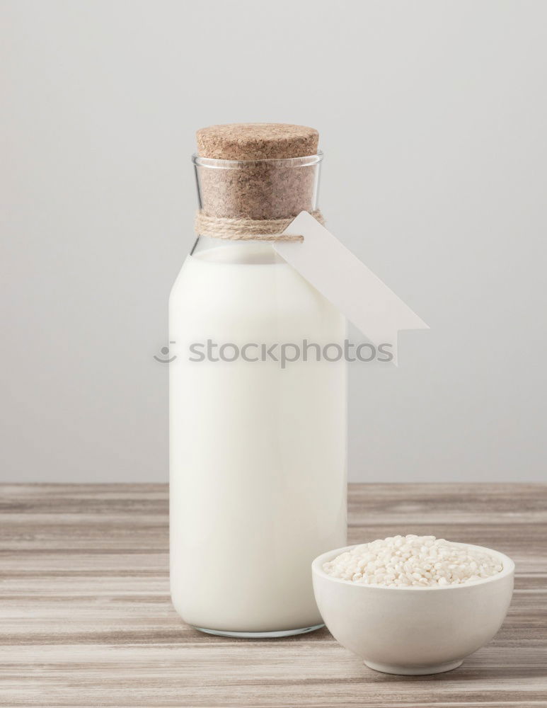 Similar – Glass bottle of milk Milk