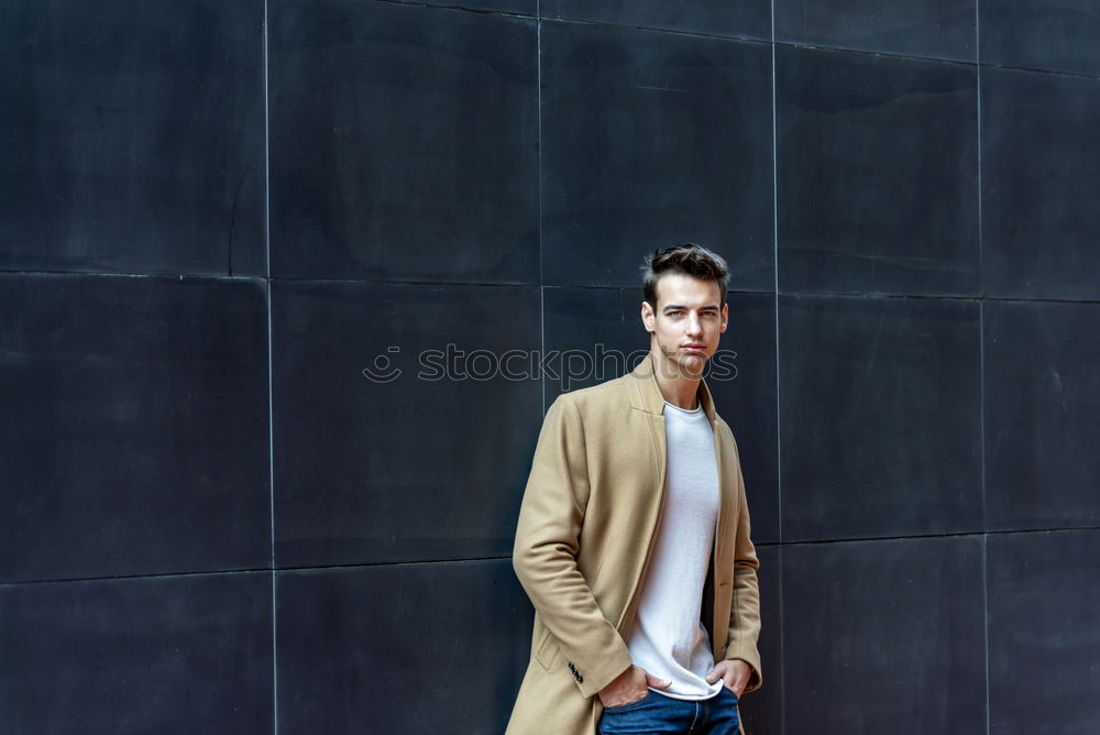 Similar – Image, Stock Photo young man with duffle coat waits in the house entrance