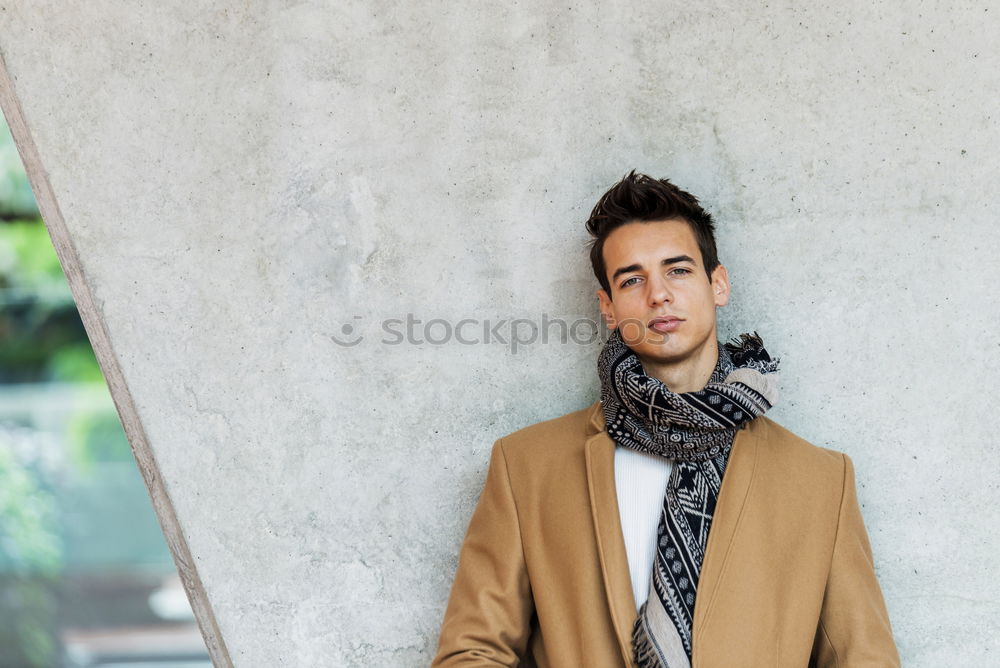 Similar – Image, Stock Photo Young man wearing winter clothes in the street sitting