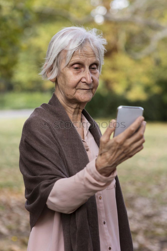 Senior citizen with smartphone